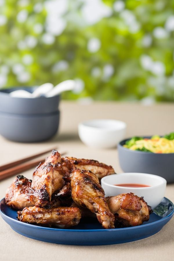 Barbecue chicken wings serves noodles with hot dipping sauce