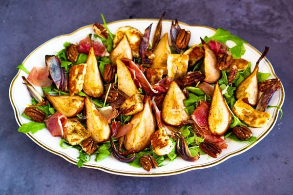salad with stewed pear, pecan and halloumi