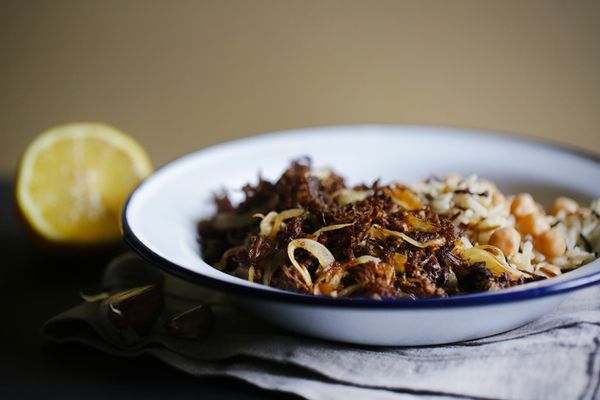 Pulled beef meat with wild rice and chickpeas, cuban cuisine