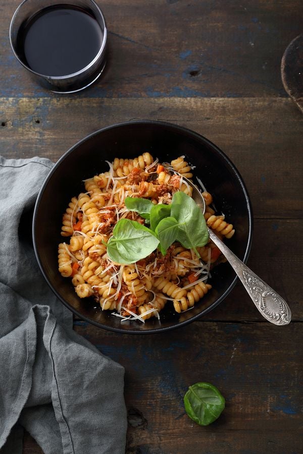 italian pasta bolognese with wine, food top view