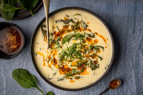 warm yogurt soup with spinach and chili butter