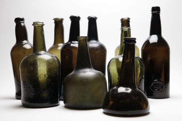 "Collection of antique wine bottles 18th / eighteenth and 19th nineteenth century, onion bottle, black glass, mallet bottle, English & Dutch"
