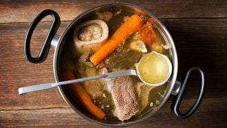 Freshly cooked beef soup in large pot