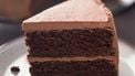 Chocolade frosting op een taart