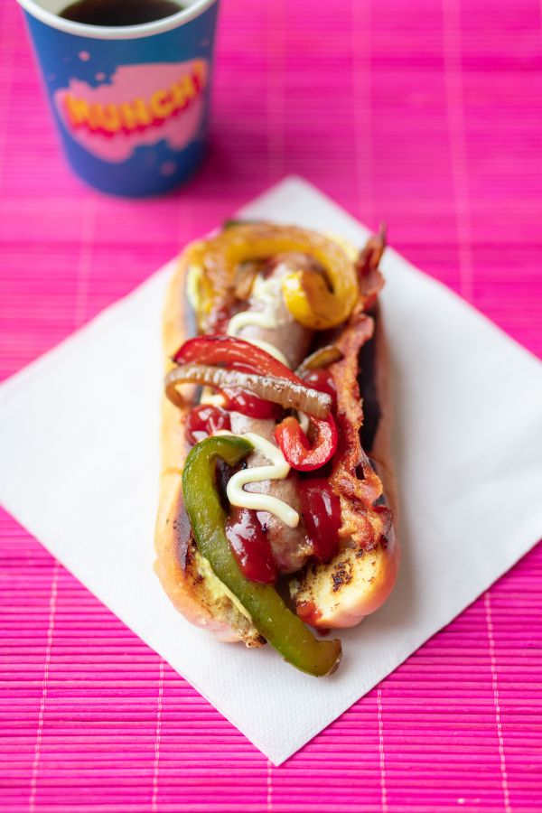 Hot dogs with bacon and bell pepper