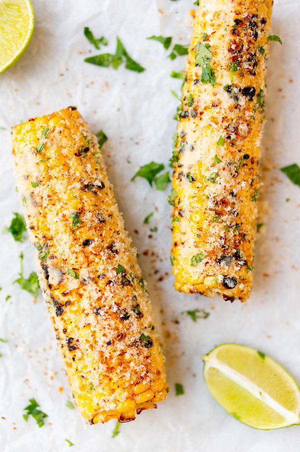 Mexican corn on the cob with cheese and chili