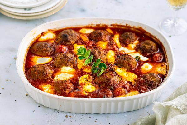 Oven dish with meatballs in tomato sauce